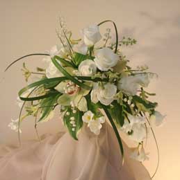 Cymbidium, lily-of-the-valley, roses and freesia crescent bouquet