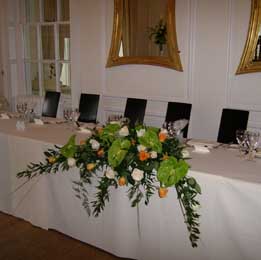 Anthurium and rose top table arrangment